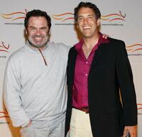 Dennis Miller and David Glickman at the Michael J. Fox Foundation for Parkinson's Research Summer Lawn Party.