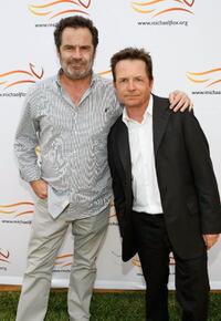 Dennis Miller and Michael J. Fox at the Michael J. Fox Foundation for Parkinson's Research Summer Lawn Party.