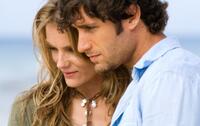 Susan Misner as Darby Thomas and Michael Lombardi as Josh Anders in "Cayman Went."