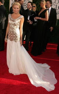 Sienna Miller at the 64th Annual Golden Globe Awards.