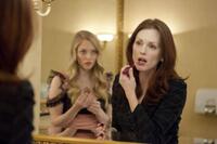 Amanda Seyfried as Chloe and Julianne Moore as Catherine Stewart in "Chloe."