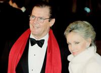 Roger Moore and his wife Christina 'Kiki' Tholstrup at the Royal Film Performance and World Premiere of "The Chronicles Of Narnia".