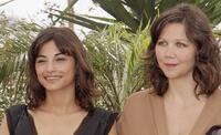 Julie Bataille and Maggie Gyllenhaal at the photocall of "Paris Je T'Aime" during the 59th edition of the International Cannes Film Festival.