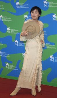 Kaori Momoi at the photocall of "Sukiyaki Western Django" during the 64th Venice Film Festival.