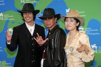 Ito Hideaki, Miike Takashi and Kaori Momoi at the photocall of "Sukiyaki Western Django" during the 64th Venice Film Festival.