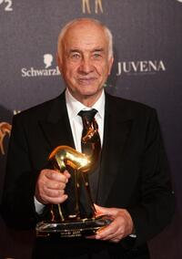 Armin Mueller-Stahl at the annual Bambi Awards, winner in the category 'Acting', accepts his award.