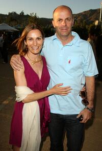 Neal H. Moritz and Guest at the Malibu Lumber Yard grand opening.