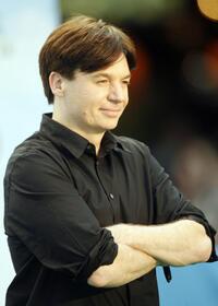 Mike Myers poses for photographers on the "green" carpet.