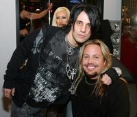Criss Angel and Vince Neil at the Tattoo Parlor grand Opening.