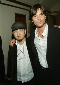 Takashi Shimizu and Jason Behr at the premiere of "The Grudge."