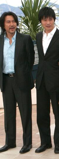 Koji Yakusho and Satoshi Nikaido at the photocall of "Babel" during the International Cannes Film Festival.