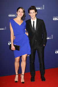 Pierre Niney and Guest at the 37th Cesar Film Awards in France.