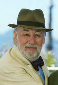 Philippe Noiret at the photocall for the film "Les Cotelettes" during the 56th Cannes Film Festival.