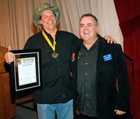 Ted Nugent and Bruce Gill at the National Bowhunters Hall of Fame during the National Field Archery Association's World Archery Festival.