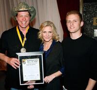 Ted Nugent, Shemane Nugent and Rocco Nugent at the National Bowhunters Hall of Fame during the National Field Archery Association's World Archery Festival.
