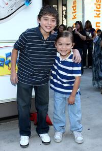 Ryan Ochoa and Raymond Ochoa at the re-opening of Kitson Kids Robertson Location.