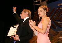 Emmanuelle Beart and Ken Loach at the Palme d'Or Award Ceremony at the 59th International Cannes Film Festival.