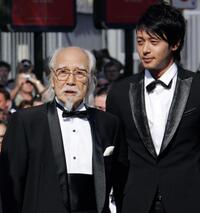 Seijun Suzuki and Jo Odagiri at the screening of "Three Burials of Melquiades Estrada" during the 58th International Cannes Film Festival.