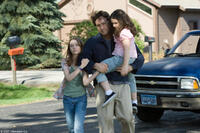 Shélan O'Keefe, John Cusack and Gracie Bednarczyk in "Grace Is Gone."