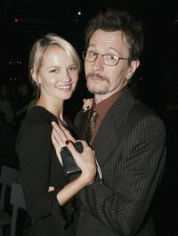 Gary Oldman and Alisa Marshall at the Hollywood afterparty for premiere of "Batman Begins".