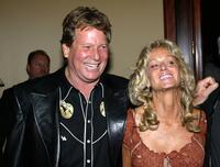 Ryan O'Neal and Farrah Fawcett at the Share Inc. 51st Annual Boomtown Party.