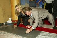 Ryan O'Neal and Tatum O'Neal at the Los Angeles place their handprints in cement at the 30th anniversary screening of "Paper Moon".