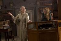 Helen Mirren as Elinor and Eliza Hope Bennett as Meggie in "Inkheart."