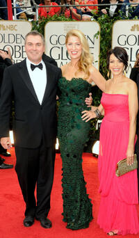 Director Chris Miller, Laura Gorenstein Miller and Latifa Ouaou at the 69th Annual Golden Globe Awards in California.