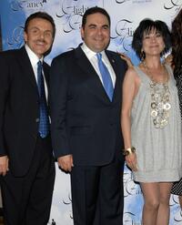 Dr. Ricardo E. Saca, Elias Antonio Saca Gonzalez and Dyana Ortelli at the cocktail party of "Flights of Fancy."