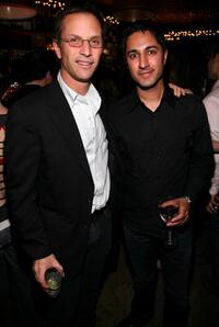 Adam Moss and Maulik Pancholy at the New York Magazine Oscar Viewing Party.