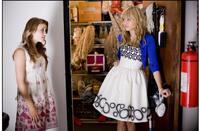 Emily Osment and Miley Cyrus in "Hannah Montana: The Movie."