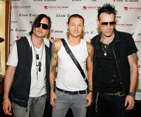 Amir Derakh, Chester Bennington and Ryan Shuck at the autograph signing session during the grand opening of Club Tattoo in Nevada.