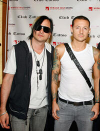 Amir Derakh and Chester Bennington at the autograph signing session during the grand opening of Club Tattoo in Nevada.