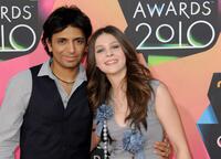 Director M. Night Shyamalan and Nicola Peltz at the Nickelodeon's 23rd Annual Kid's Choice Awards.