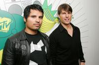 Michael Pena and Tom Cruise at the MTV's Total Request Live.