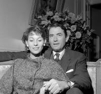 Gregory Peck and his wife Veronique Passani pose for the photographer in Paris.