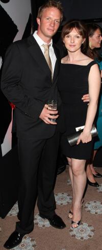 Rupert Penry-Jones and his wife at the Kuro Black Screen party.