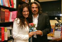 Robby Benson and Joely Fisher talking to an audience and signing copies of his new book "Who Stole The Funny A Novel of Hollywood".