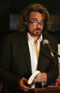 Robby Benson talking to an audience and signing copies of his new book "Who Stole The Funny A Novel of Hollywood".