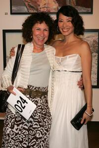 Rhea Perlman and Lucy Liu at the Lucy Liu's art exhibit and auction.