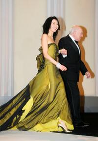 Michel Piccoli and Maggie Cheung at the Opening Ceremony Dinner at the 60th International Cannes Film Festival Opening Night.