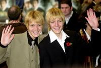 Oliver Phelps and James Phelps at the premiere of "Harry Potter and the Chamber of Secrets."