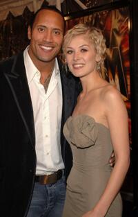 Dwayne Johnson and Rosamund Pike at the premiere of "Doom."