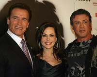 Arnold Schwarzenegger, Julie Benz and actor Sylvester Stalllone at the Las Vegas premiere of "Rambo."