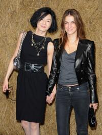Maggie Cheung and Joana Preiss at the Chanel Pret a Porter show during the Paris Womenswear Fashion Week Spring/Summer 2010.