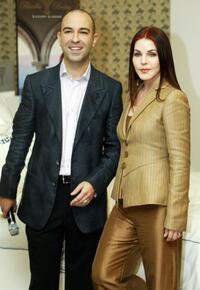 Bruno Schiavi and Priscilla Presley at the launch of "The Priscilla Presley Collection", a range of luxury bed linen.