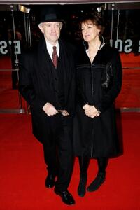 Jonathan Pryce and Guest at the European premiere of "Defiance."