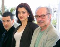Bruno Putzulu, Cecile Camp and Jean-Luc Godard at the photocall of "L'Eloge de l'Amour" during the 54th Cannes Film Festival.