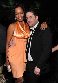 Garcelle Beauvais and Brett Ratner at the HELP HAITI benefiting The Ben Stiller Foundation and The J/P Haitian Relief Organization in New York.