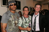 LL Cool J, Lou Reed and Mark Seliger at the Mark Seliger's 401 Projects' "Vision Of Rock" exhibition.